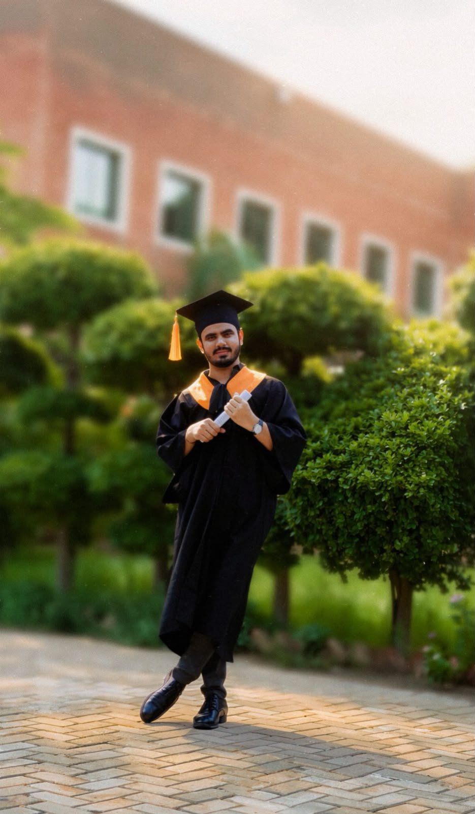 Uzair Saleem at university graduation